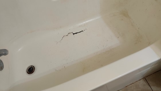 Fiberglass Tub w/ 10 inch Crack